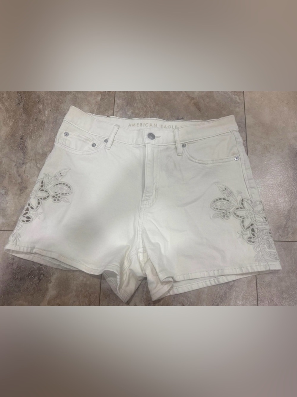 American Eagle Outfitters Cream Colored Denim Shorts with Floral Cutout Detail
